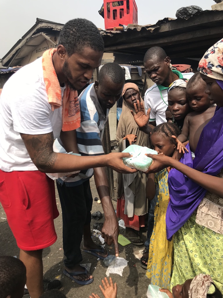 Handing food directly to a child in need
